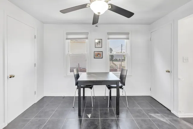 a workspace with furniture and window