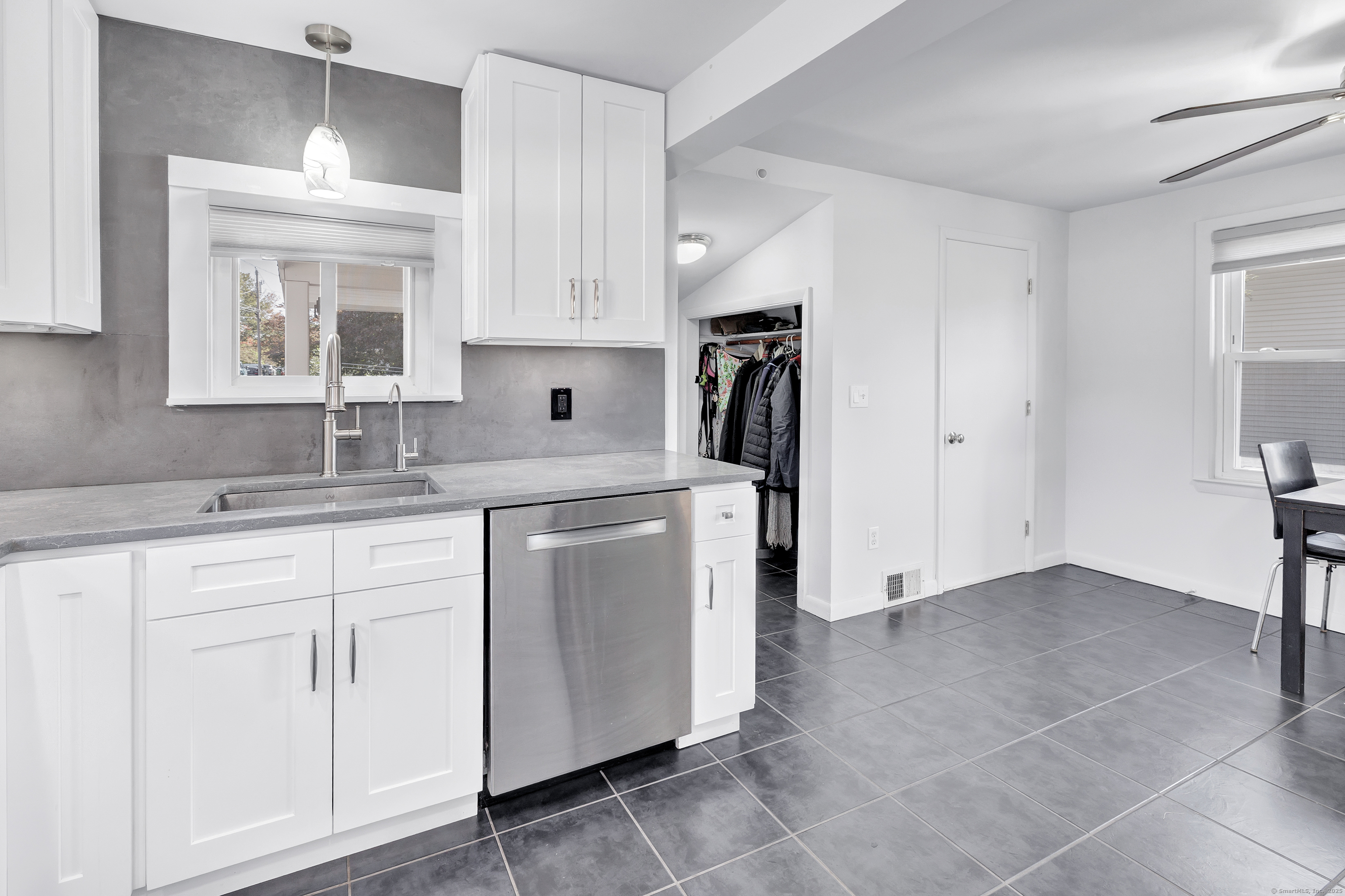 700 Huntington Road Stratford, CT 06614 - Photo 23 of 33 a kitchen with stainless steel appliances granite countertop a sink and a refrigerator