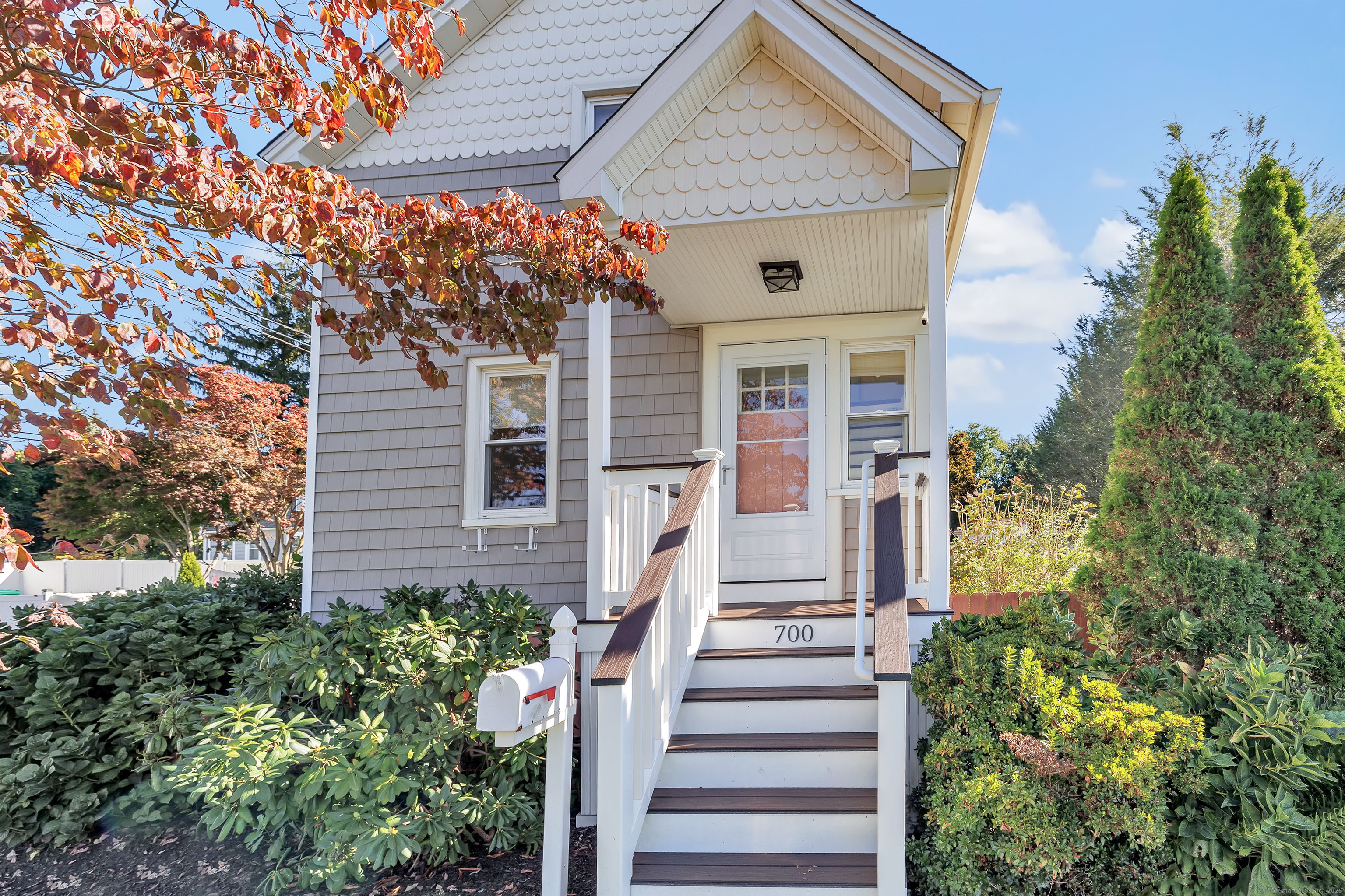 700 Huntington Road Stratford, CT 06614 - Photo 4 of 33 a front view of a house with a yard