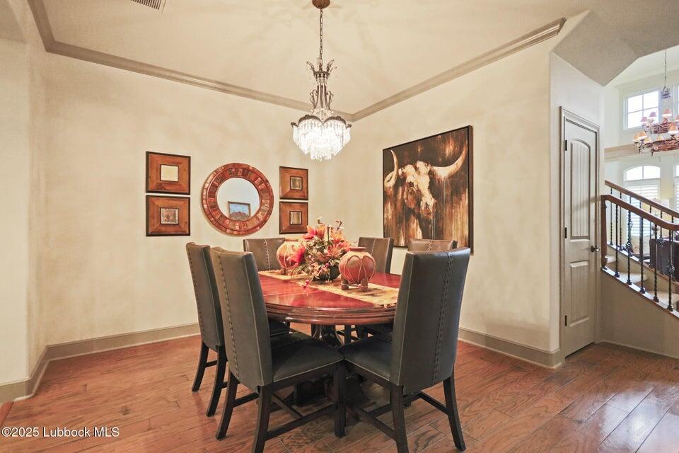 4501 19th Street, Unit 6 Lubbock, TX 79407 - Photo 11 of 44 a dining room with furniture and window