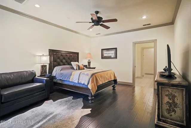 a bedroom with bed furniture and a window