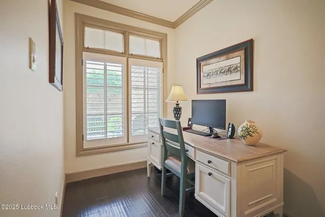 a workspace with furniture and window