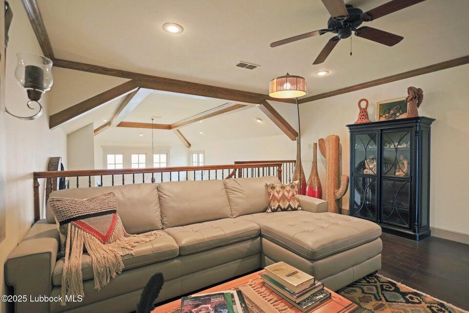 4501 19th Street, Unit 6 Lubbock, TX 79407 - Photo 28 of 44 a bedroom with furniture and a ceiling fan