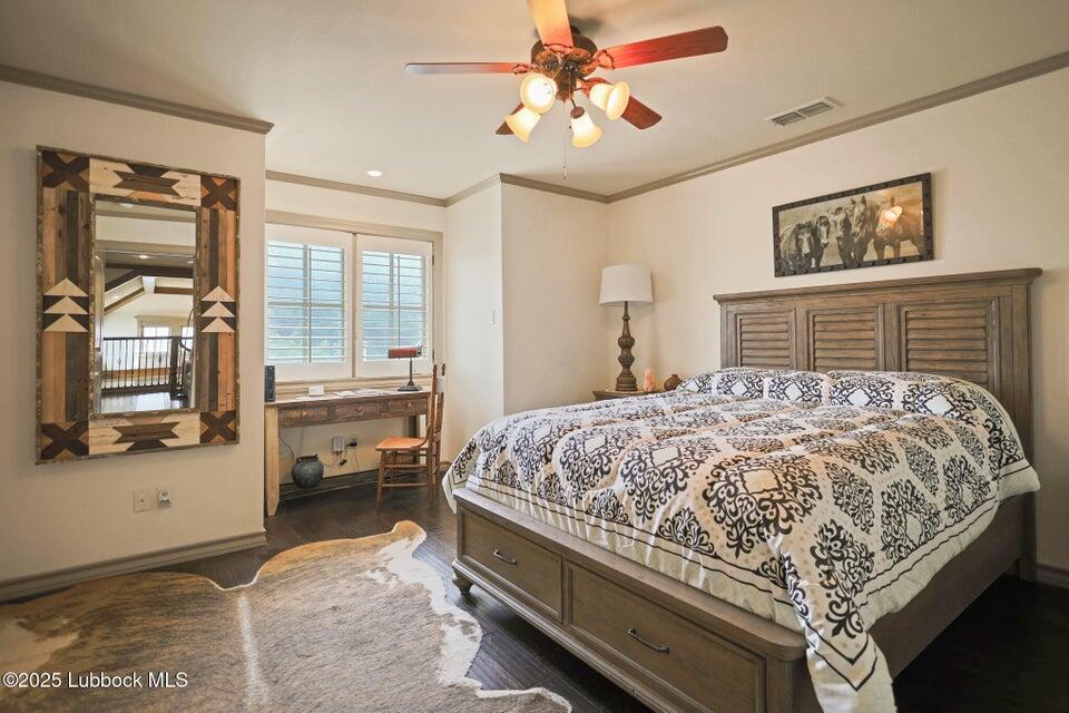 4501 19th Street, Unit 6 Lubbock, TX 79407 - Photo 34 of 44 a bed sitting in a bedroom next to a window