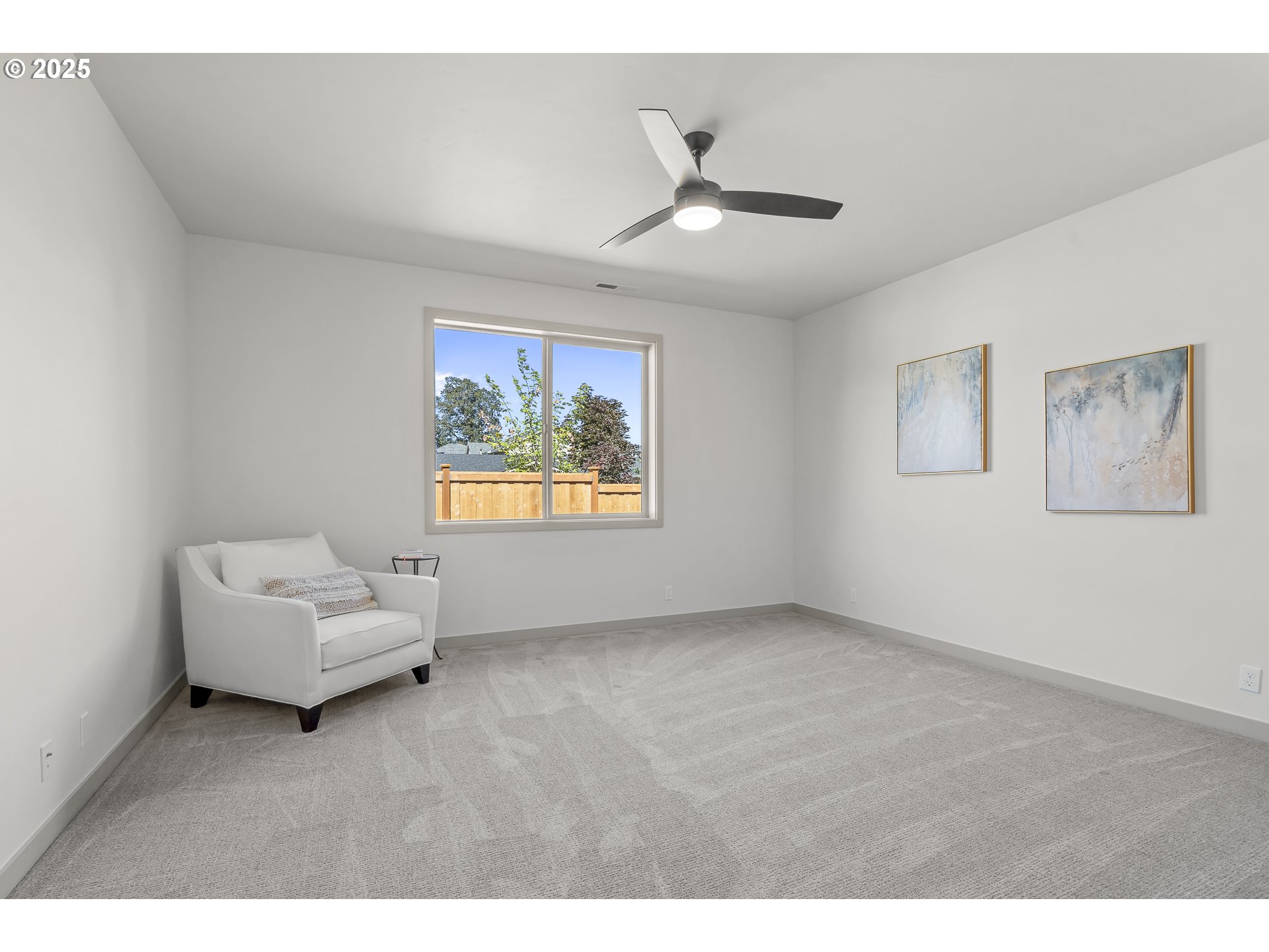 955 Oak Meadows Place Springfield, OR 97477 - Photo 19 of 37 a living room with furniture and a window