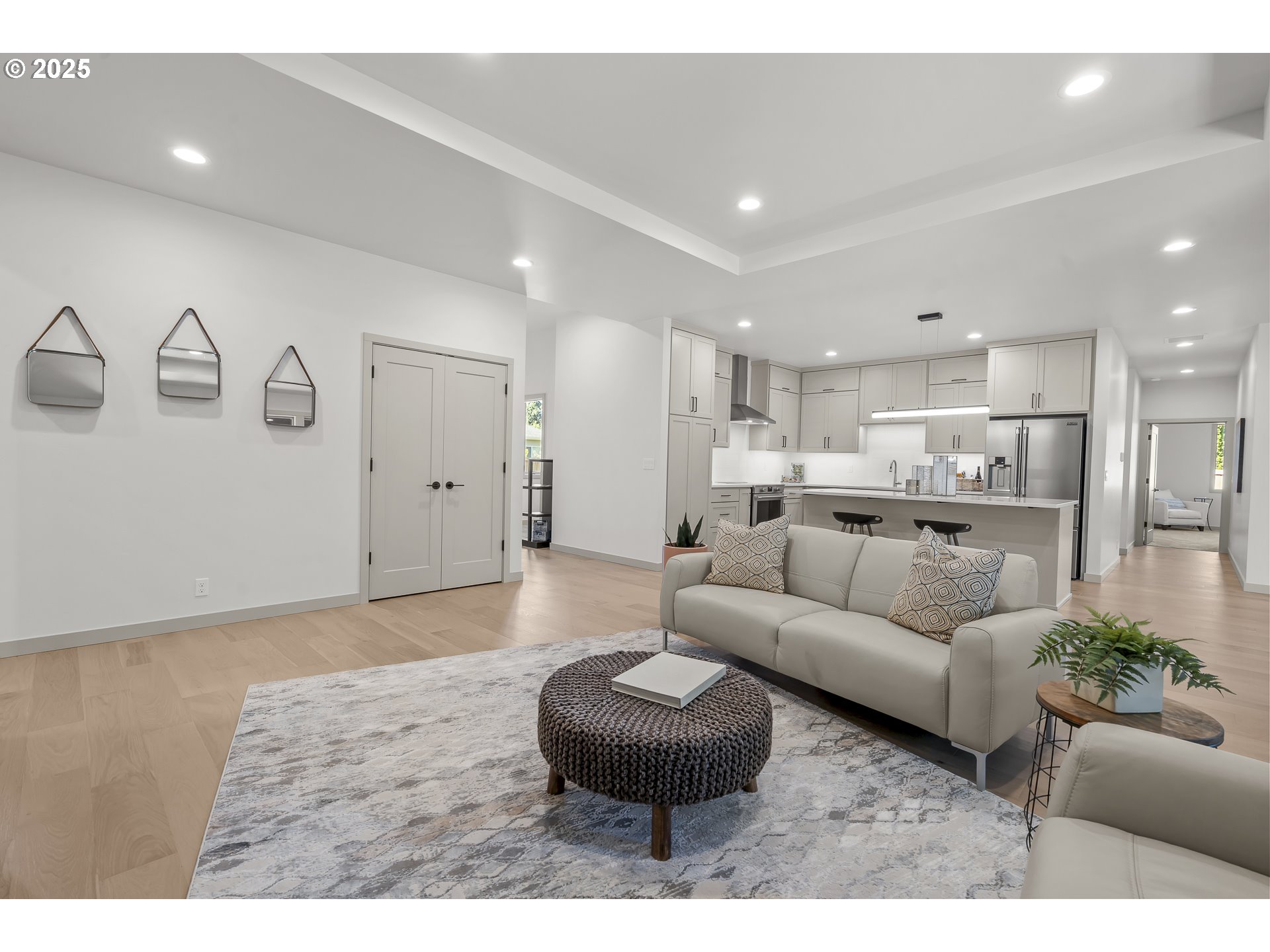 955 Oak Meadows Place Springfield, OR 97477 - Photo 5 of 37 a living room with furniture and a view of kitchen