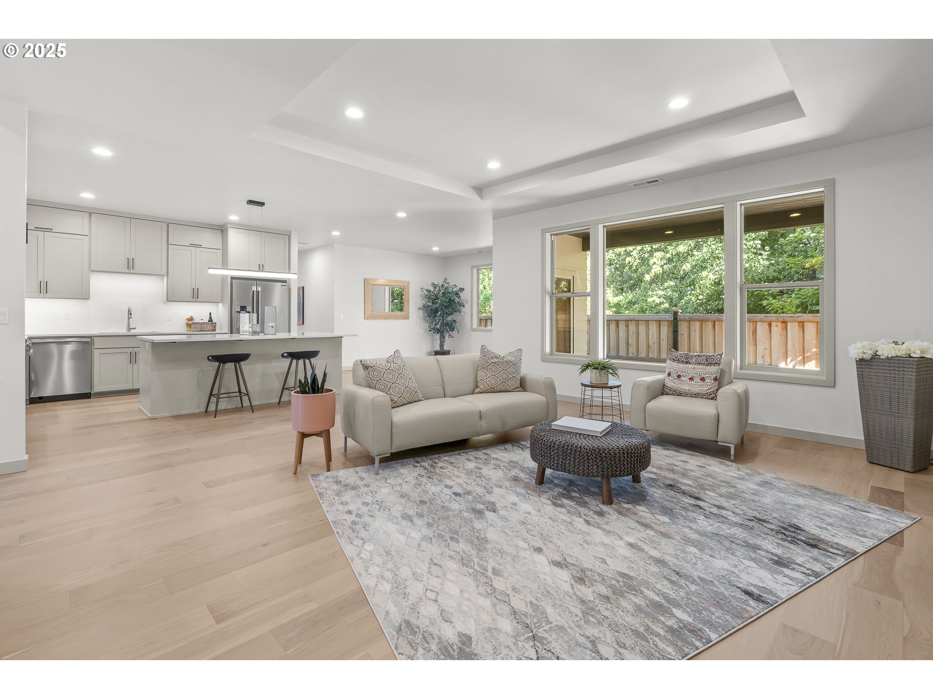 955 Oak Meadows Place Springfield, OR 97477 - Photo 6 of 37 a living room with furniture and a large window