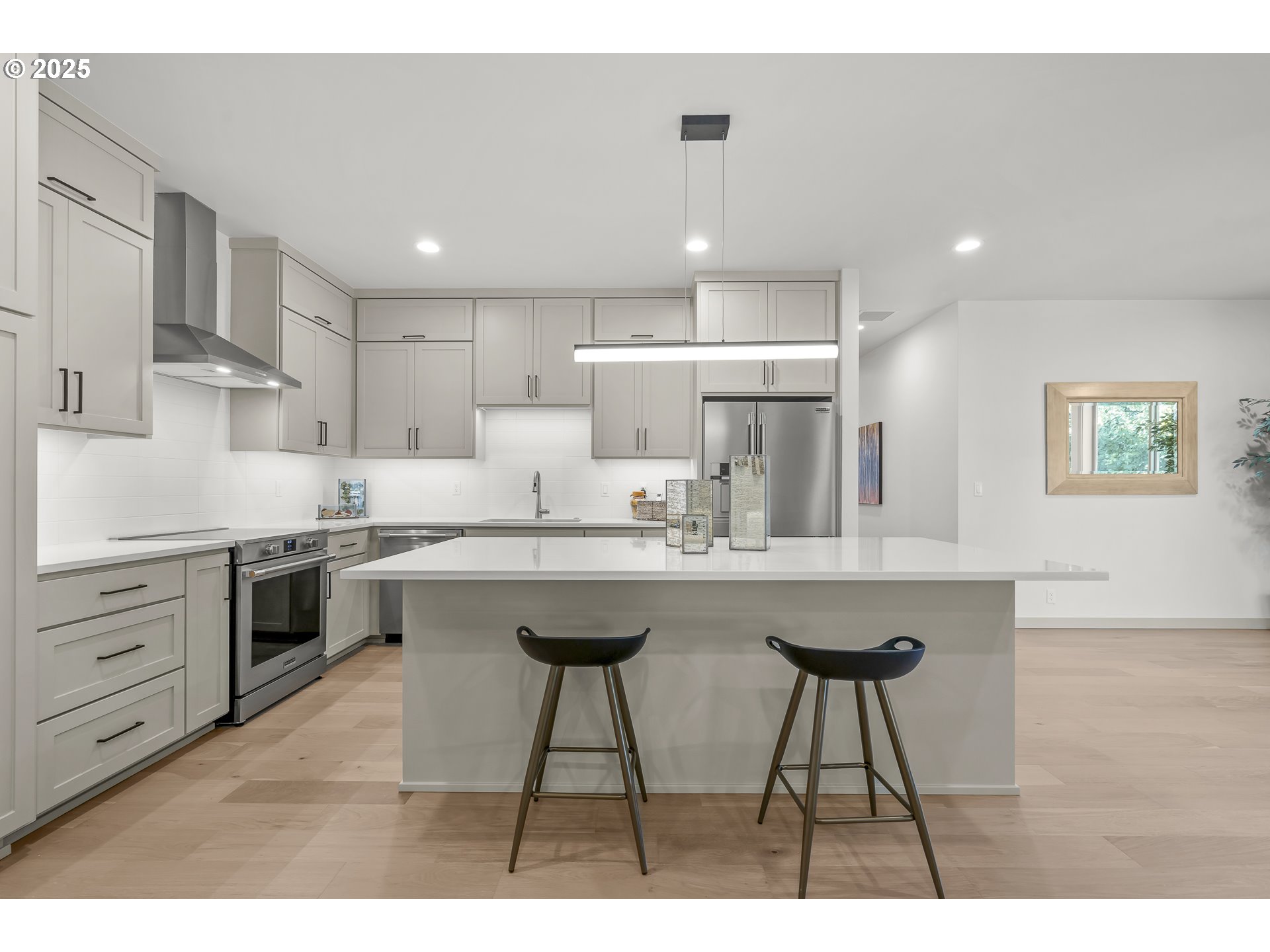 955 Oak Meadows Place Springfield, OR 97477 - Photo 7 of 37 a kitchen with cabinets and chairs