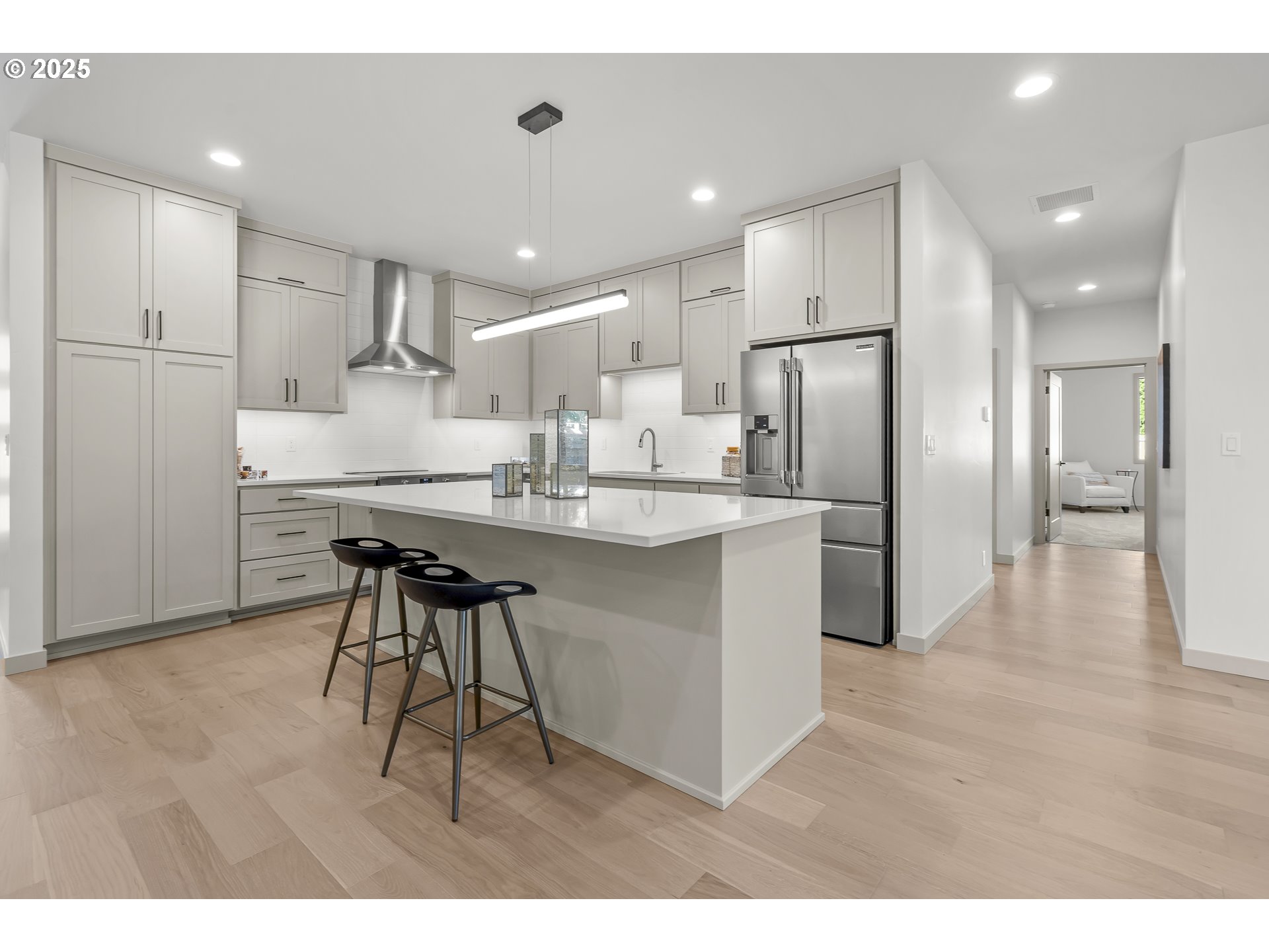 955 Oak Meadows Place Springfield, OR 97477 - Photo 8 of 37 a kitchen with refrigerator cabinets and a sink