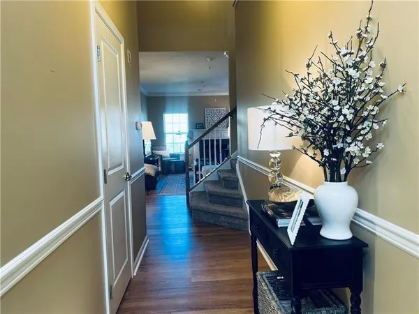 a view of livingroom with furniture and wooden floor