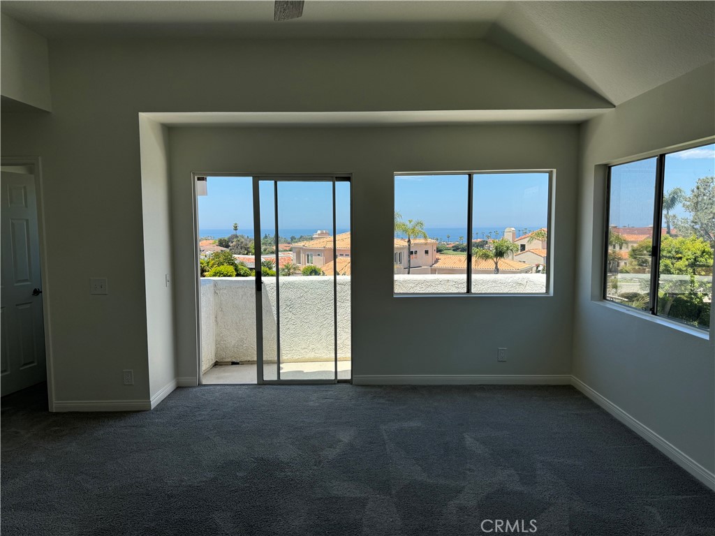 25 St Kitts Dana Point, CA 92629 - Photo 8 of 14 a view of empty room with floor to ceiling window