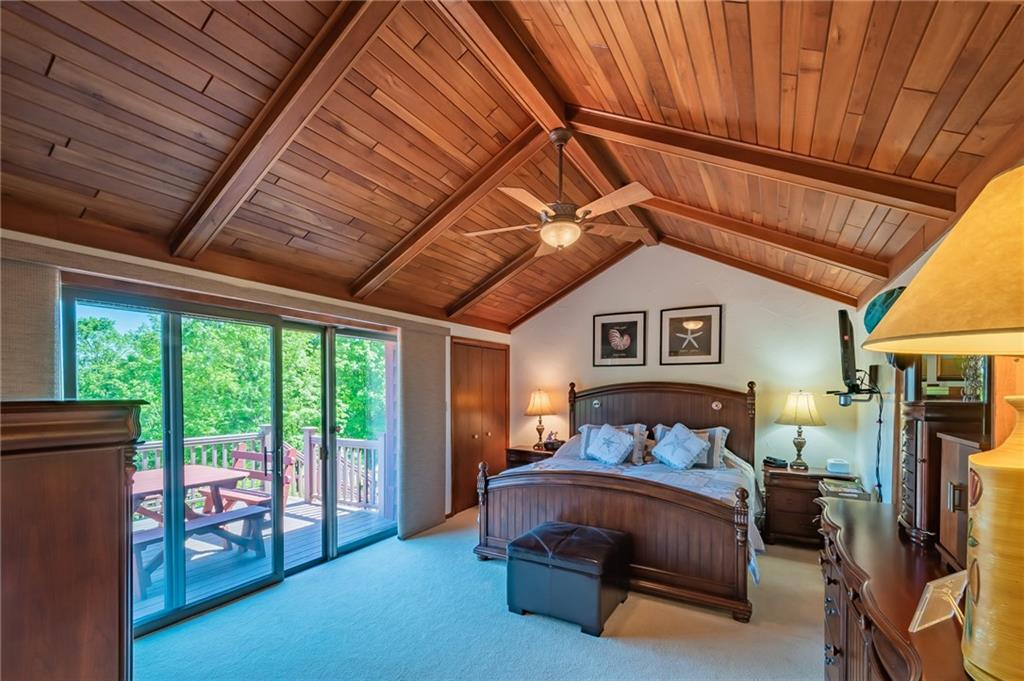 265 4 Seasons Road Boswell, PA 15531 - Photo 7 of 25 MAIN HOUSE: MASTER BEDROOM WITH FULL BATH AND HUGE WALK IN CLOSET. ENJOY THE VIEW FROM YOUR OWN PRIVATE DECK