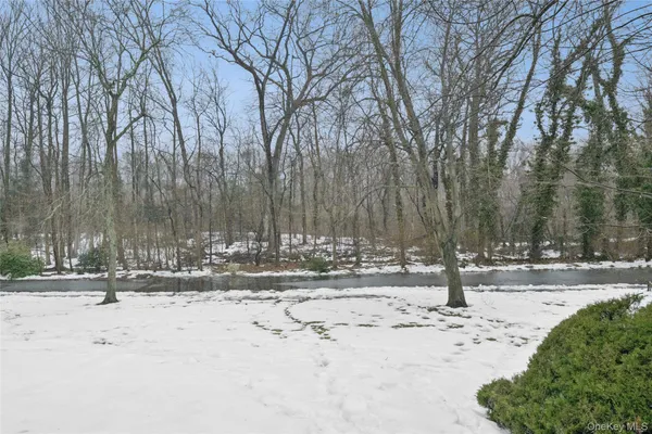 a view of snow on the road