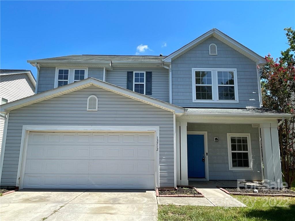 13712 Rutherglen Court Charlotte, NC 28213 - Photo 1 of 22 a front view of a house with a yard