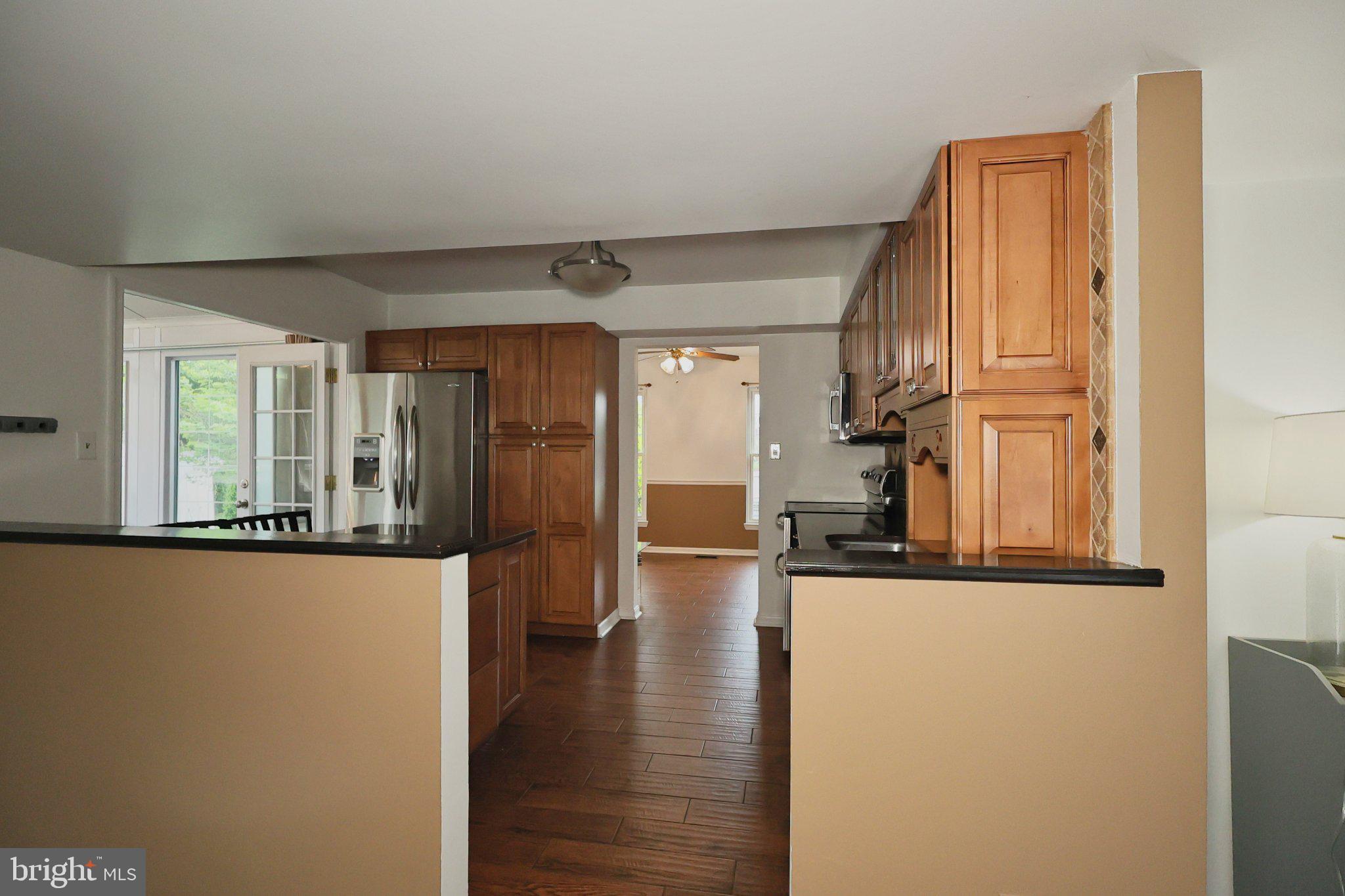 4402 Fieldgreen Road Nottingham, MD 21236 - Photo 25 of 52 Inviting kitchen with warm wood accents.