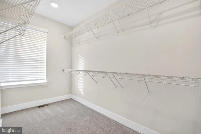 a view of a room with racks on the wall