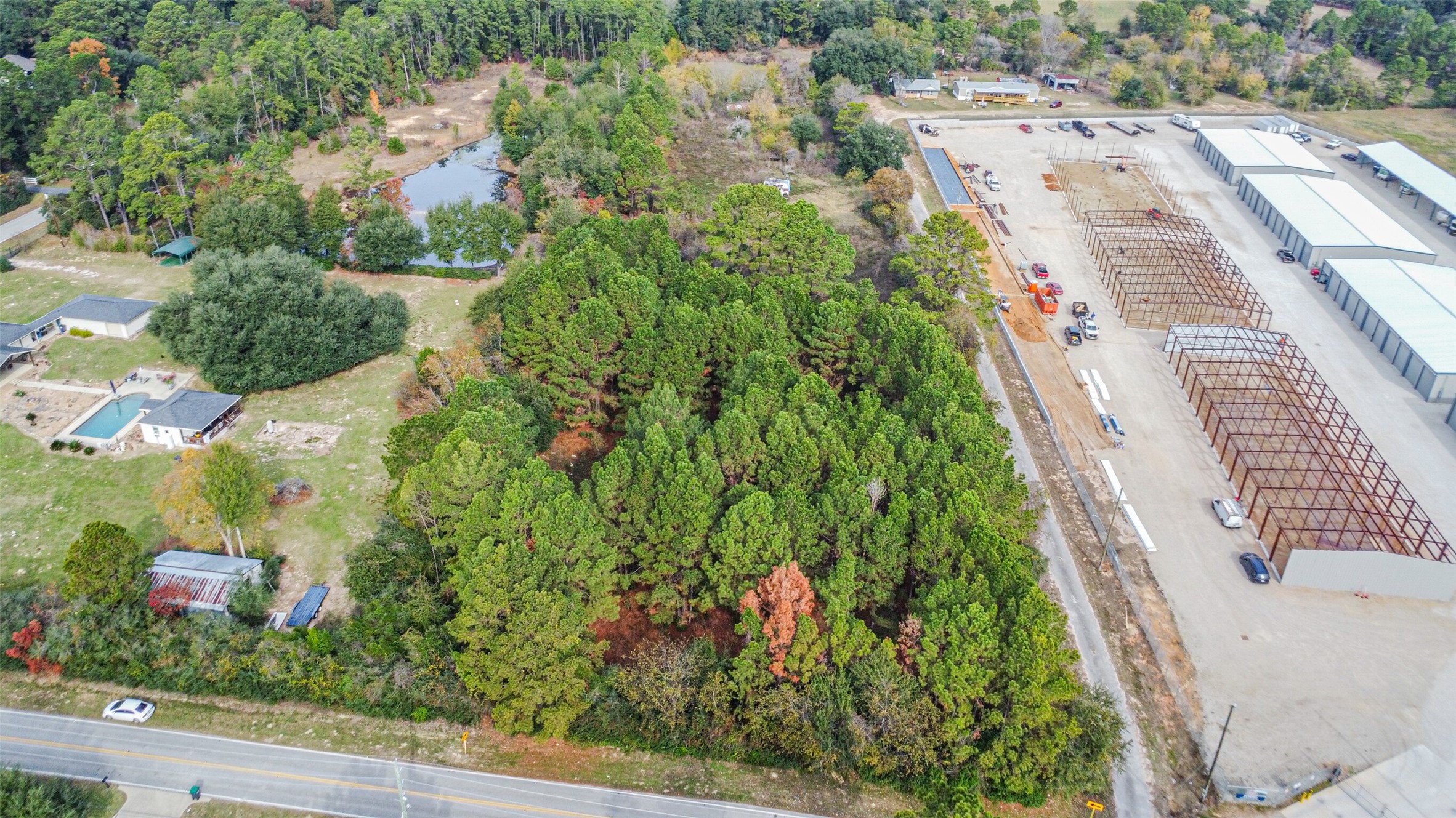22422 Tomball Cemetery Road Tomball, TX 77377 - Photo 2 of 17 an aerial view of residential house with outdoor space and trees all around