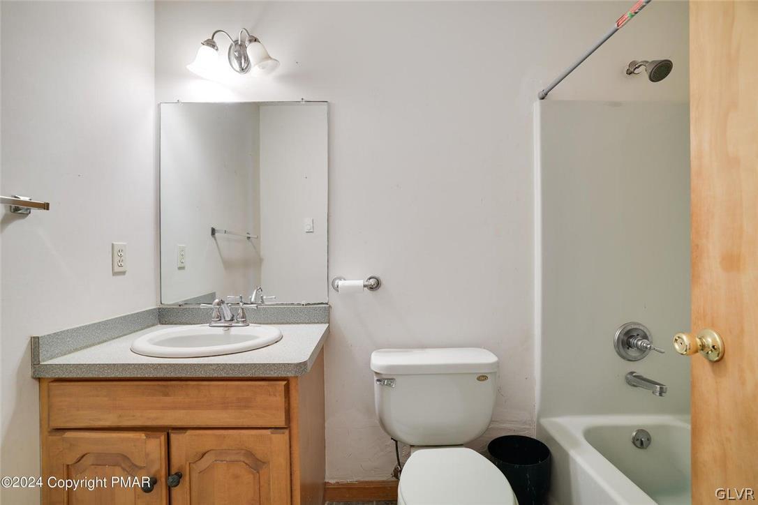 1728 Clover Road Long Pond, PA 18334 - Photo 20 of 34 a bathroom with a sink toilet and shower
