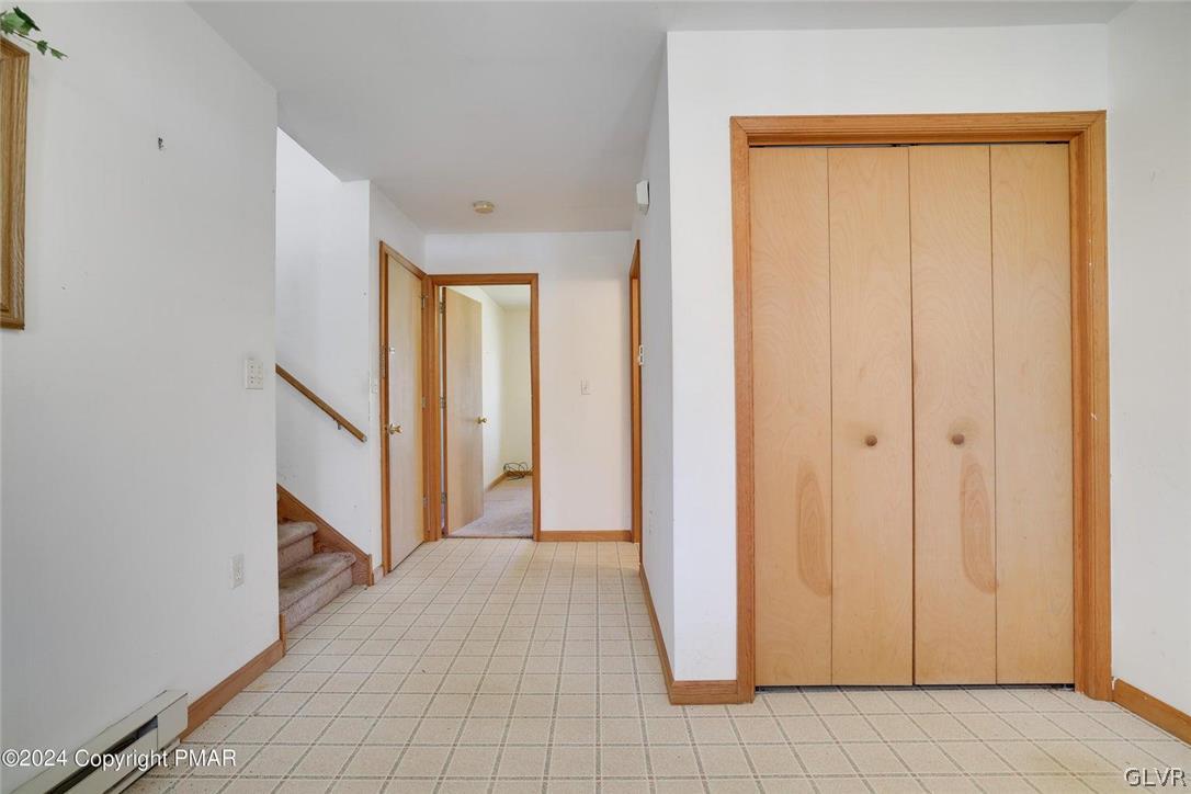 1728 Clover Road Long Pond, PA 18334 - Photo 8 of 34 a view of a hallway with a door