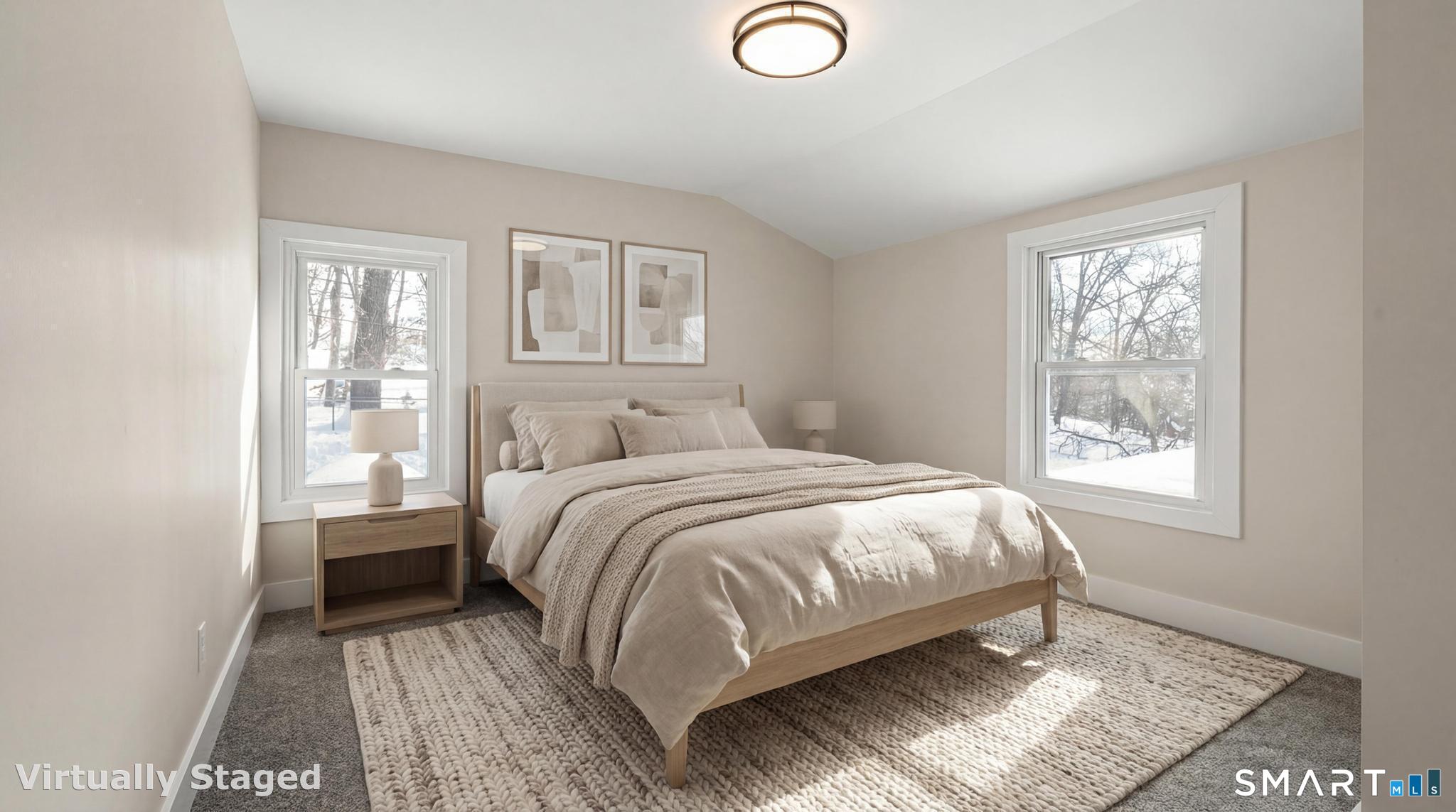 6 Juniper Ridge Drive Danbury, CT 06811 - Photo 25 of 36 a bedroom with a bed and wooden floor