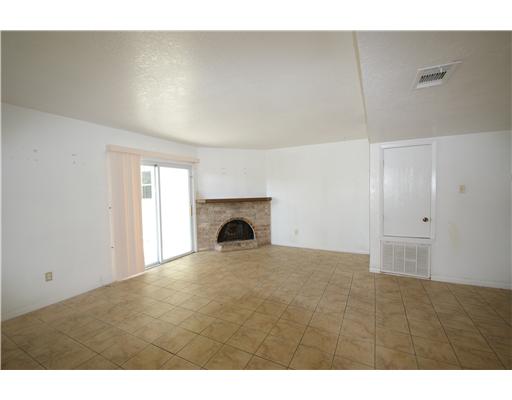 5013 Meandering Lane Corpus Christi, TX 78413 - Photo 2 of 9 a view of empty room with a fireplace