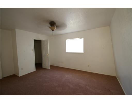5013 Meandering Lane Corpus Christi, TX 78413 - Photo 4 of 9 a view of an empty room with a window