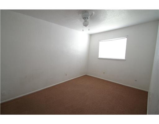 5013 Meandering Lane Corpus Christi, TX 78413 - Photo 7 of 9 a view of an empty room and a window