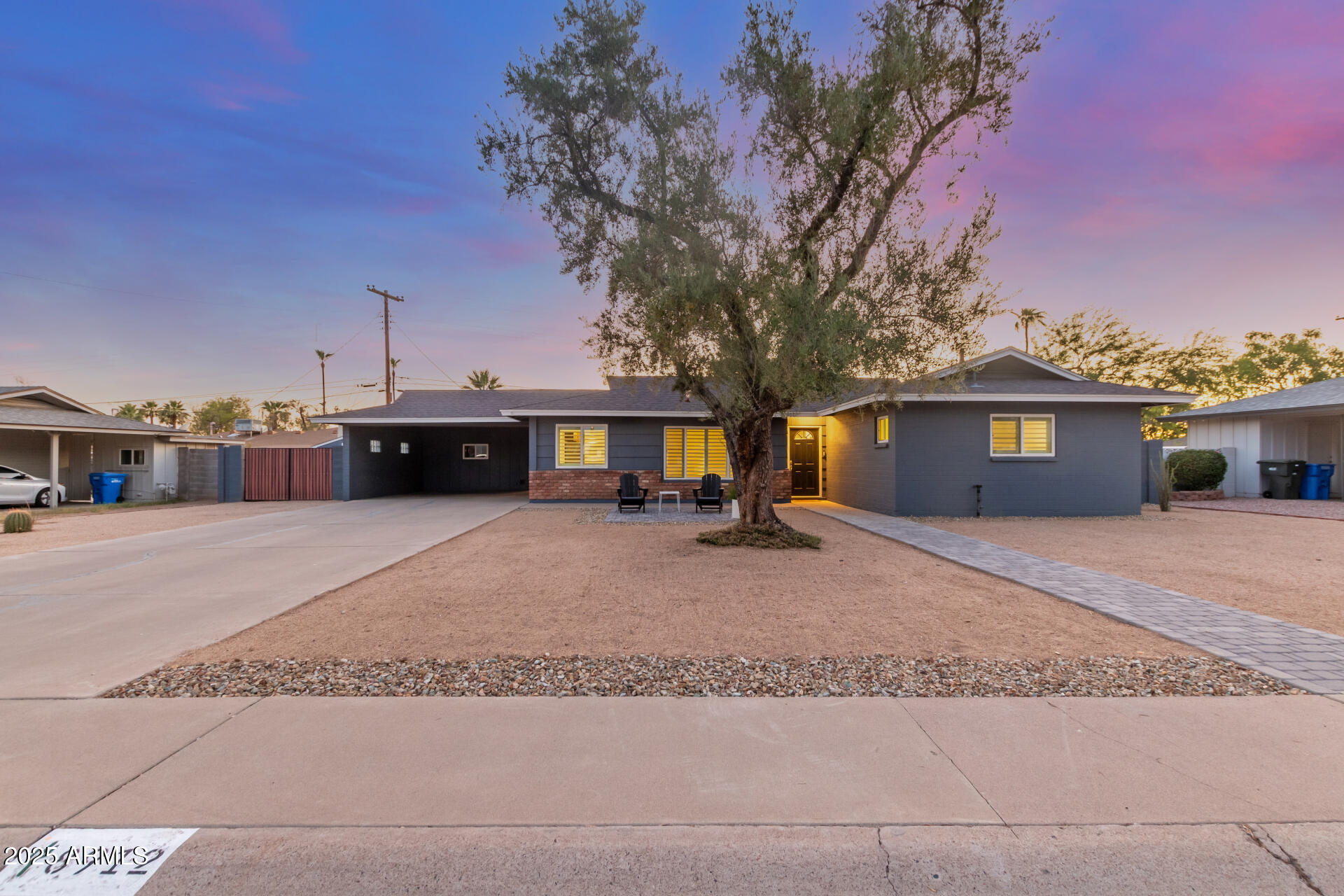 8912 North 17th Avenue Phoenix, AZ 85021 - Photo 1 of 33 a view of a house with a yard and garage