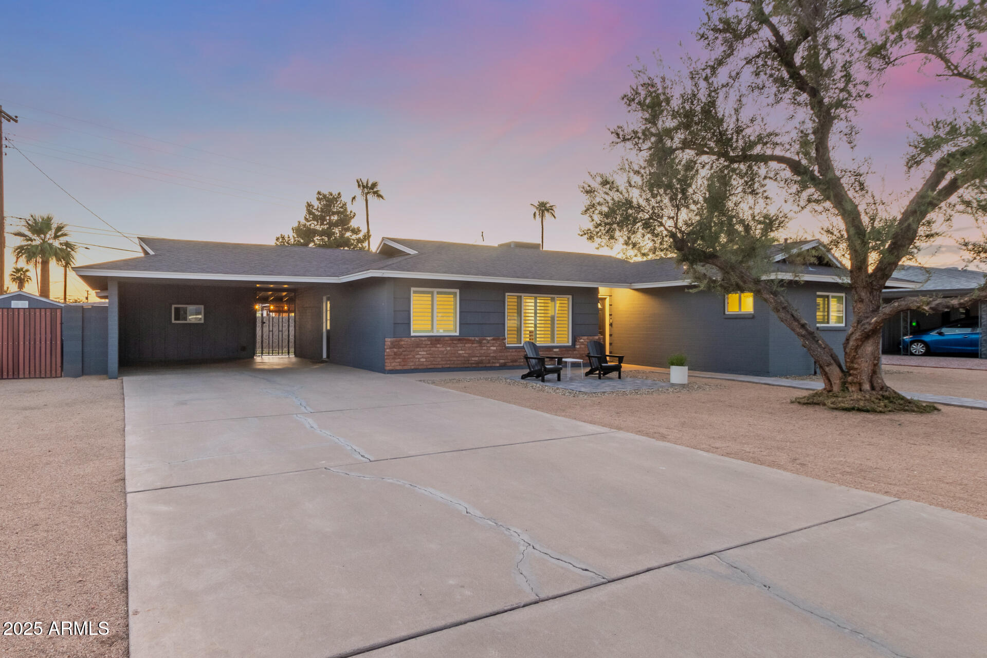 8912 North 17th Avenue Phoenix, AZ 85021 - Photo 2 of 33 a view of a house with a yard and a large tree