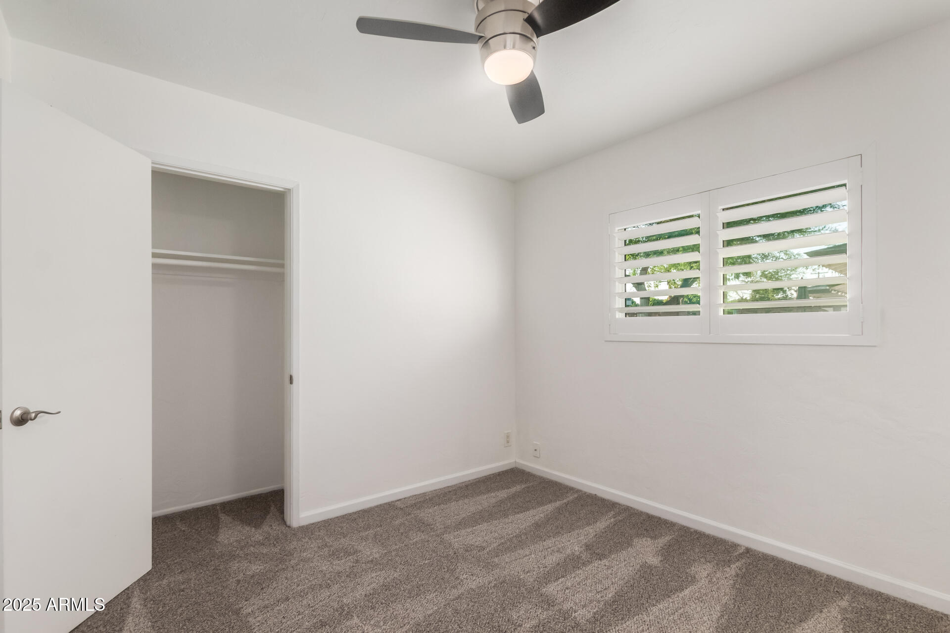 8912 North 17th Avenue Phoenix, AZ 85021 - Photo 22 of 33 a view of an empty room with a window