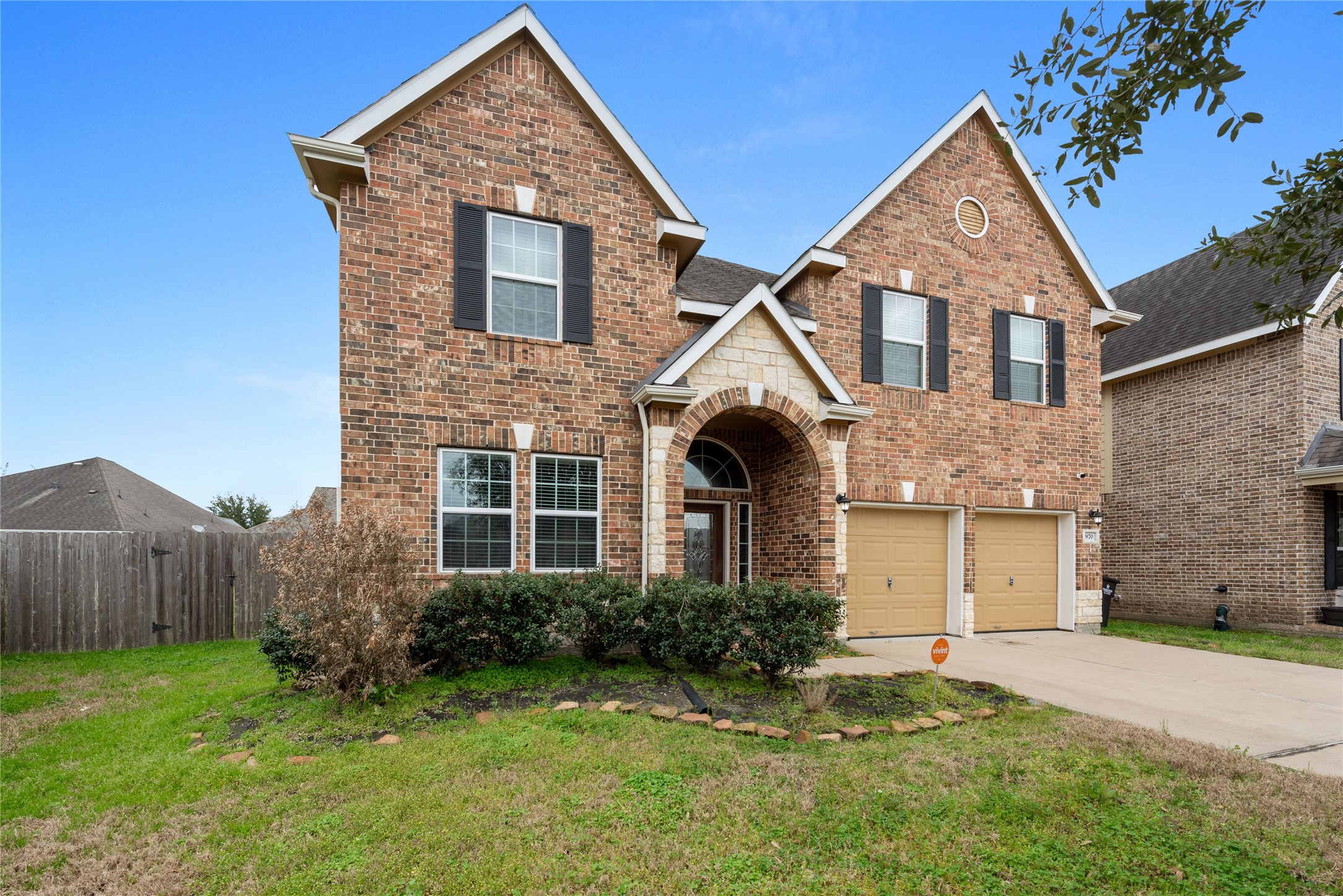970 Jennifer Street Alvin, TX 77511 - Photo 1 of 27 a front view of a house with a yard and garage