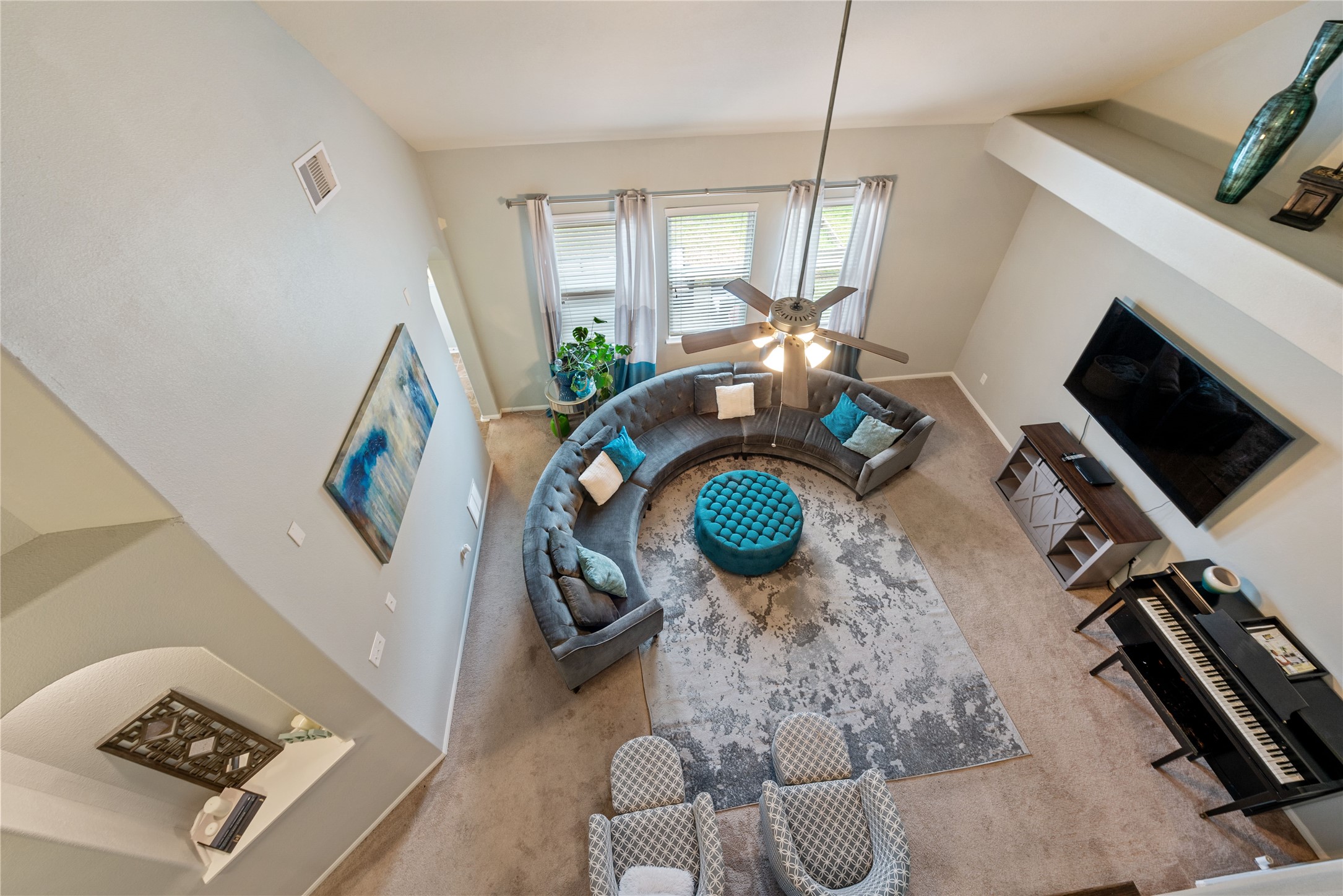 970 Jennifer Street Alvin, TX 77511 - Photo 14 of 27 a living room with furniture and a flat screen tv