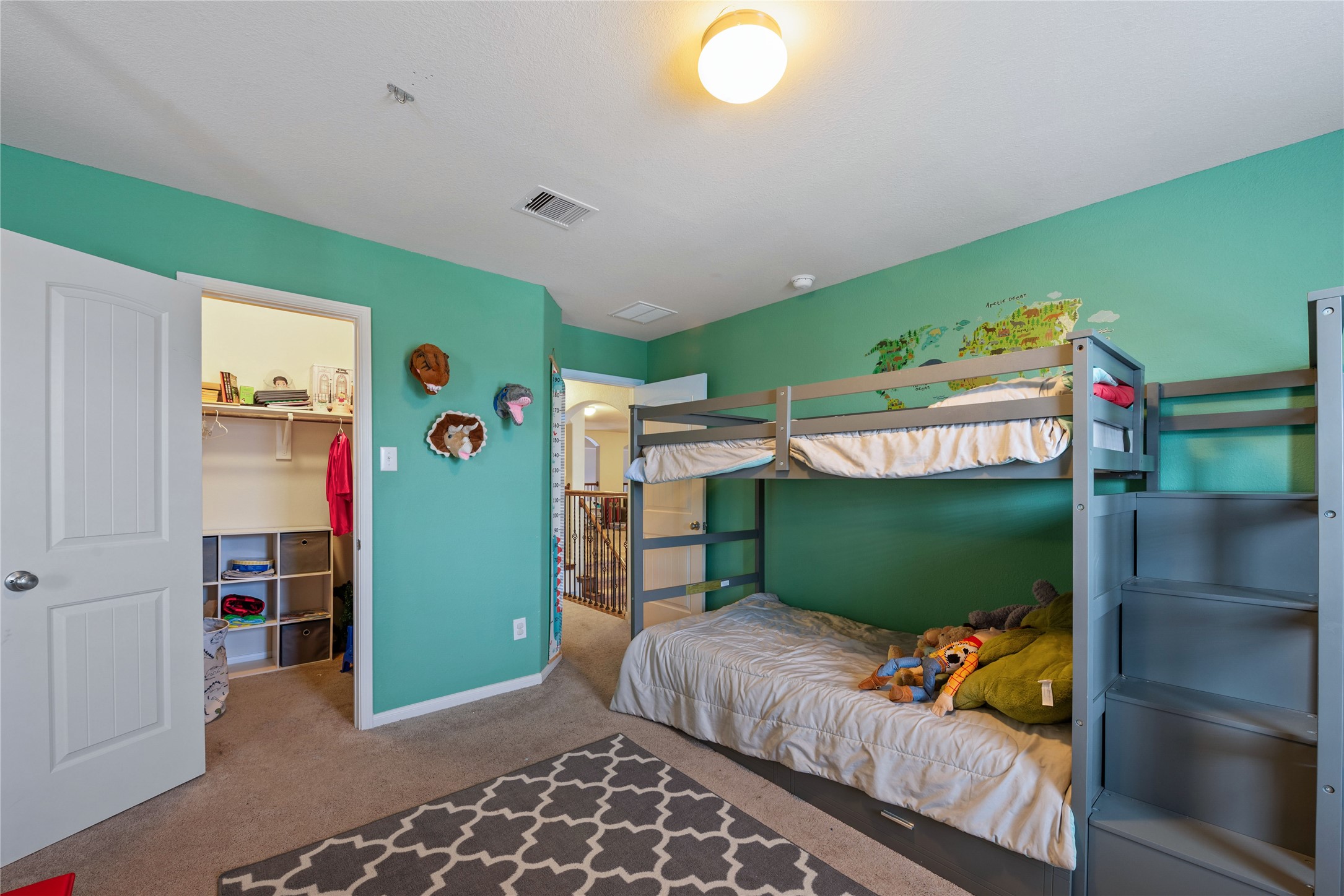 970 Jennifer Street Alvin, TX 77511 - Photo 23 of 27 a bedroom with bed and a window