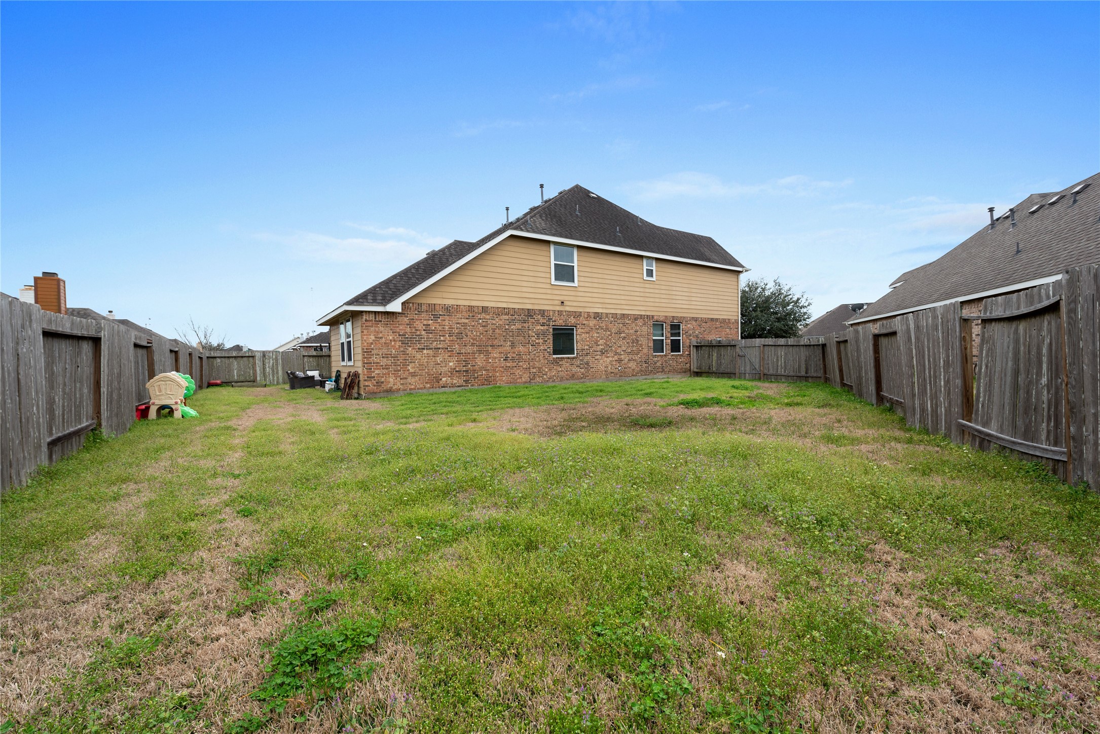 970 Jennifer Street Alvin, TX 77511 - Photo 25 of 27 a house view with a outdoor space