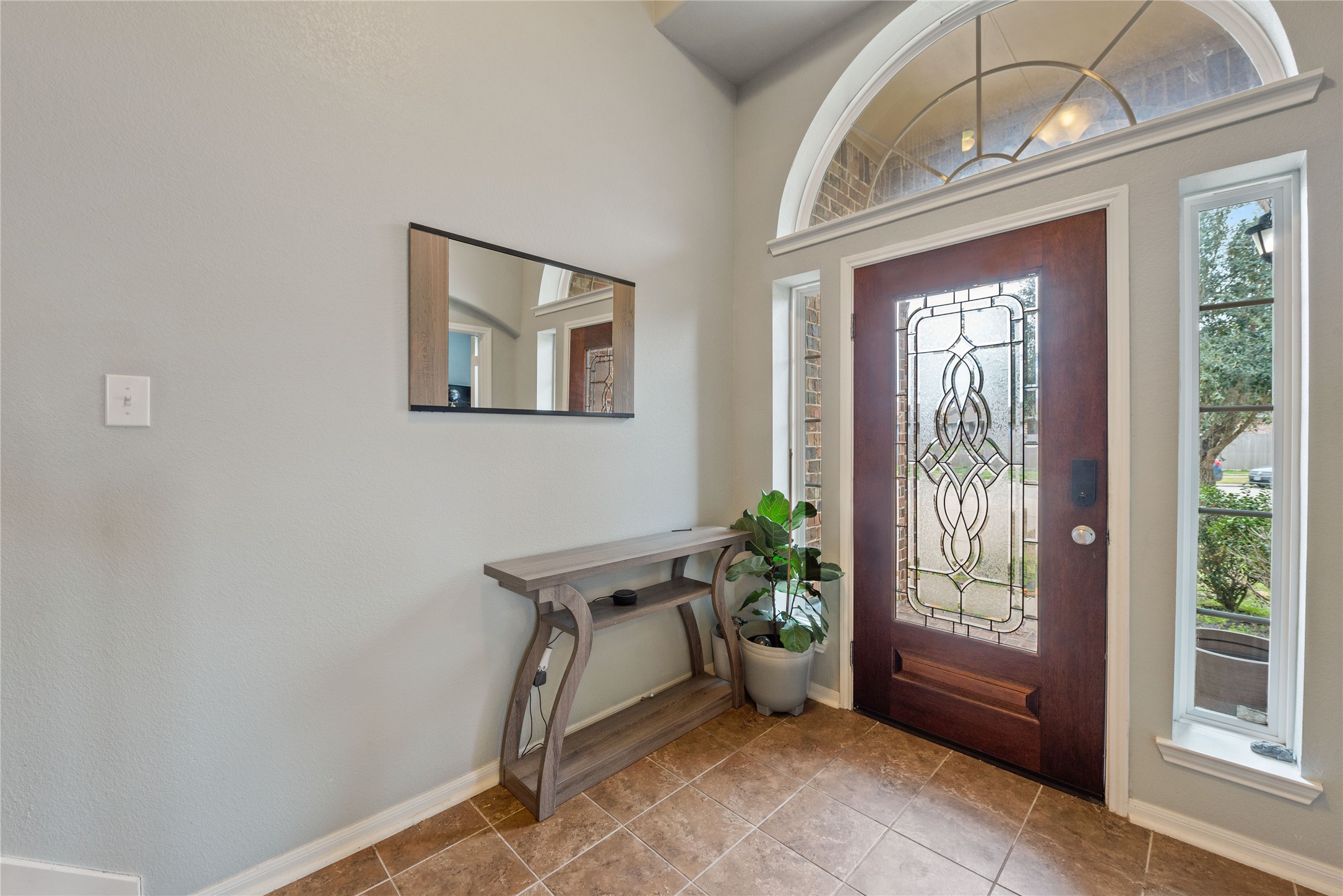 970 Jennifer Street Alvin, TX 77511 - Photo 3 of 27 a view of an entryway with wooden floor