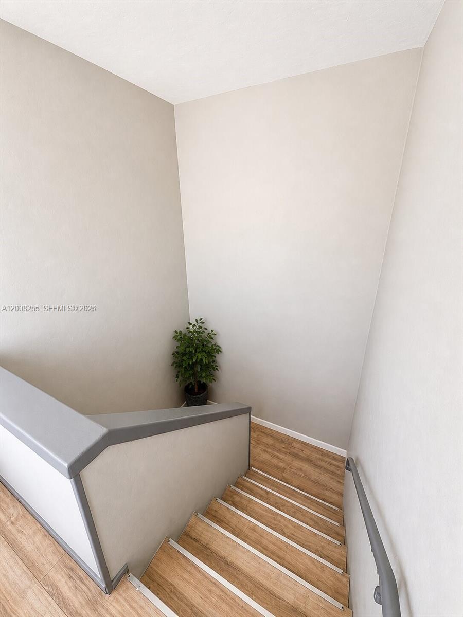 375 Southwest 19th Avenue, Unit 4 Miami, FL 33135 - Photo 11 of 30 a view of small space with wooden floor