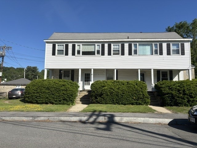45 Webster Street, Unit 2 Woburn, MA 01801 - Photo 1 of 10 a front view of a house