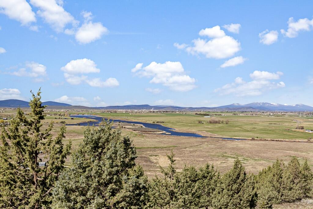 13351 Crystal Springs Road Klamath Falls, OR 97603 - Photo 14 of 51 a view of an ocean and a mountain