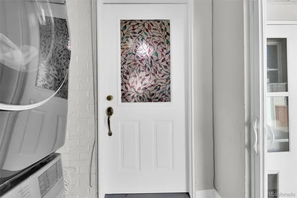 a bathroom with a shower and a sink