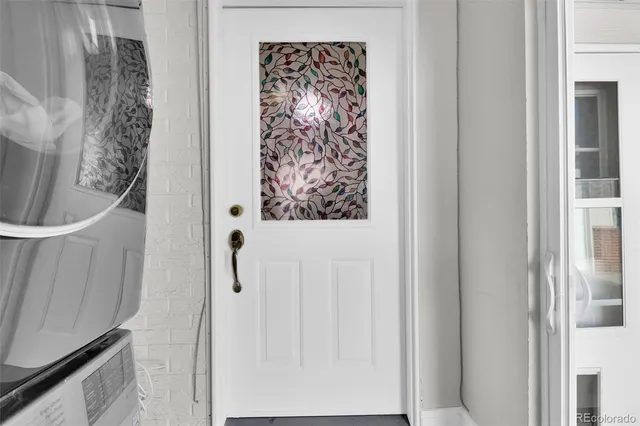 a bathroom with a shower and a sink