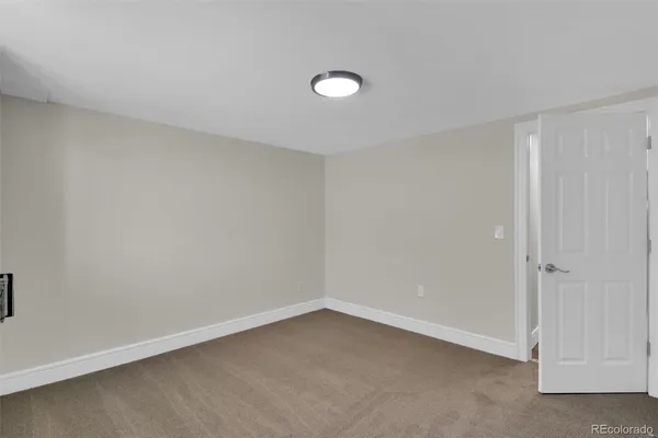 a view of a balcony with furniture