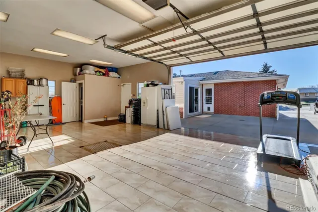 a outdoor space with lots of white furniture