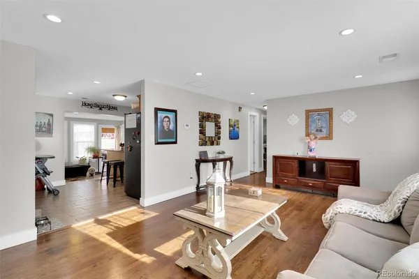 a living room with furniture and a table
