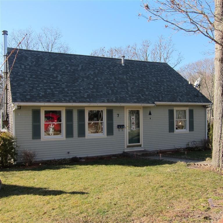 7 Oak Ridge Road East Falmouth, MA 02536 - Photo 1 of 13 a front view of a house with a yard