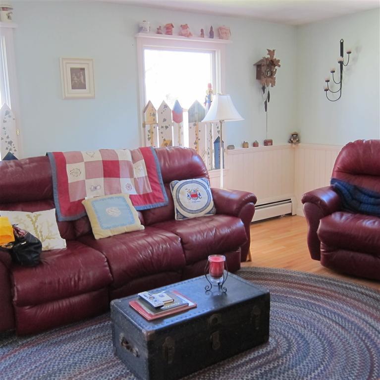 7 Oak Ridge Road East Falmouth, MA 02536 - Photo 2 of 13 a living room with furniture rug and window