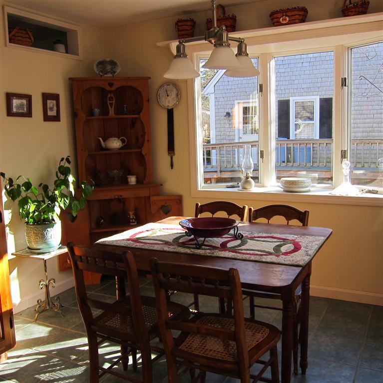 7 Oak Ridge Road East Falmouth, MA 02536 - Photo 4 of 13 a view of a dining room with furniture window and wooden floor