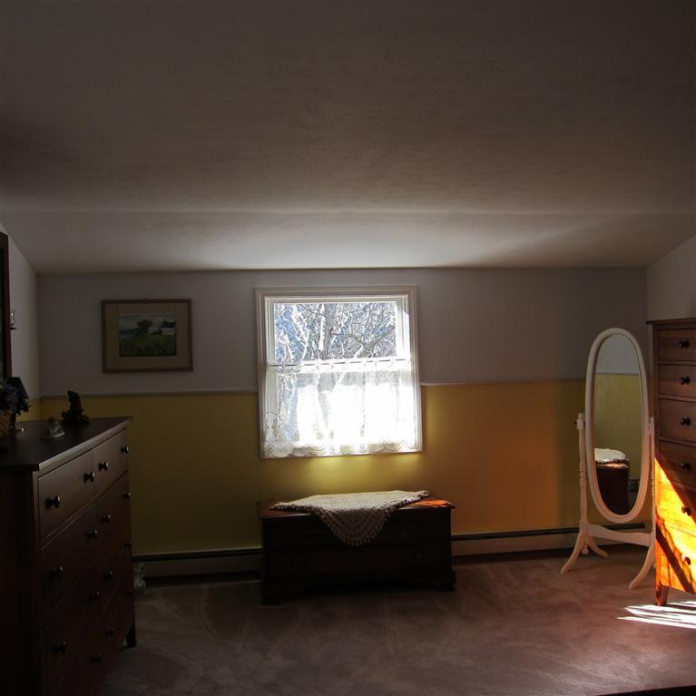 7 Oak Ridge Road East Falmouth, MA 02536 - Photo 6 of 13 a living room with furniture a air conditioner vent and a window