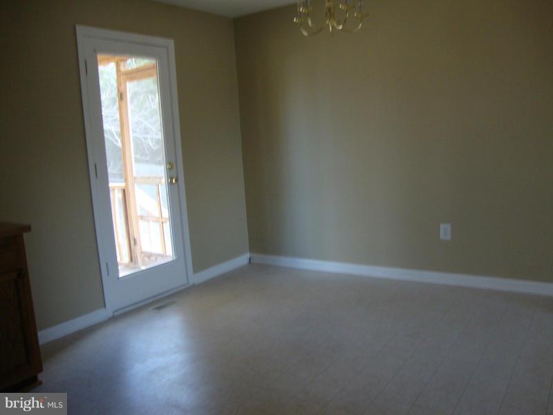 202 Choptank Road Stafford, VA 22556 - Photo 4 of 13 a view of empty room with window