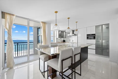 a view of a dining room and chairs in a kitchen
