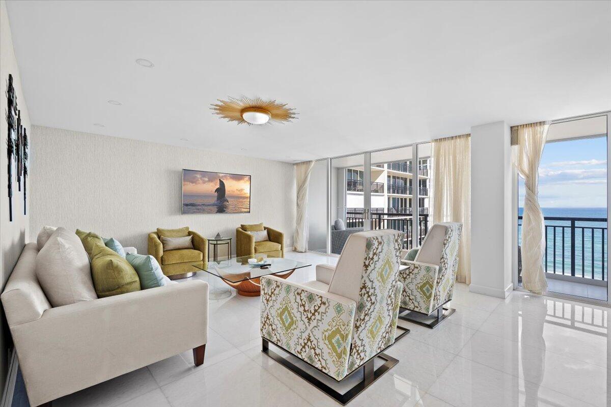 2000 South Ocean Boulevard, Unit 11D Boca Raton, FL 33432 - Photo 6 of 31 a living room with furniture and a window
